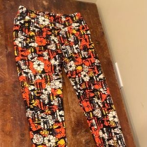EUC OS Luluroe leggings floral print with black, white, yellow and orange colors